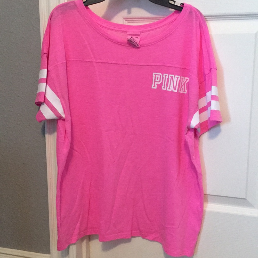 Bright pink colored PINK brand tee
